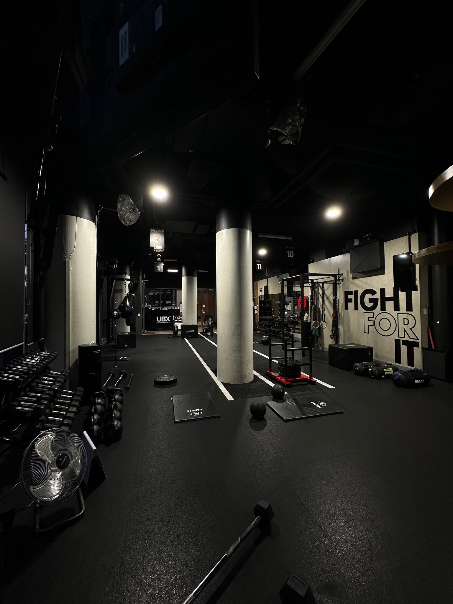 Strength floor with Fight For It branding
